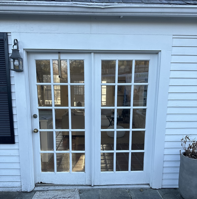 Wood hinged door with a rotted panel in Norwalk CT
